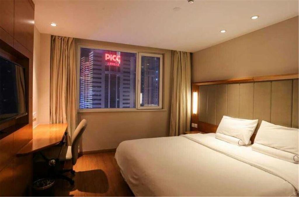 Ji Hotel Xianggang Middle Road Qingdao Værelse billede