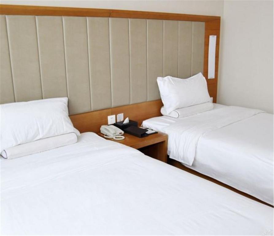 Ji Hotel Xianggang Middle Road Qingdao Værelse billede